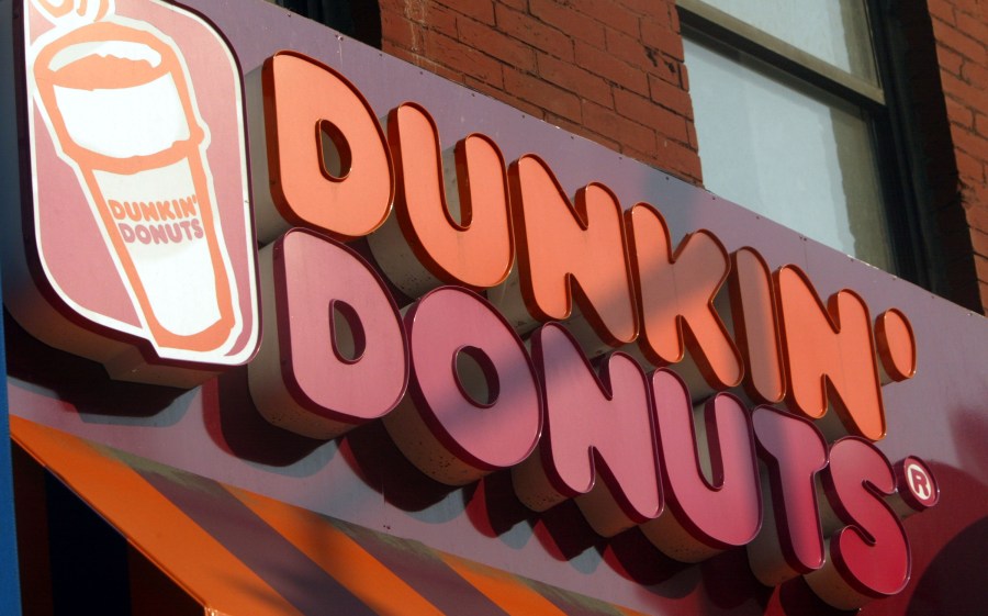 A Dunkin' Donuts sign is seen in a file photo. (Credit: Mario Tama/Getty Image)