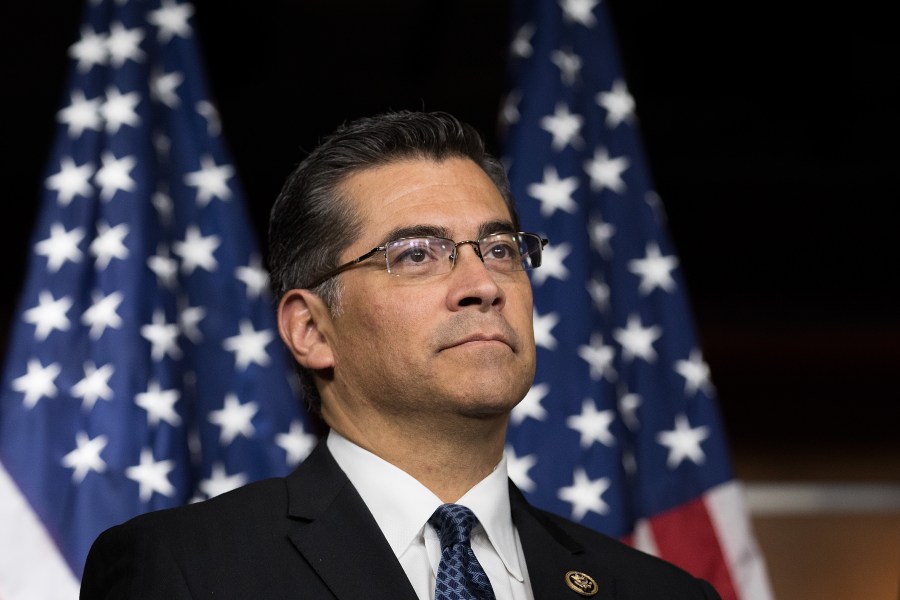 California Attorney General Xavier Becerra listens during a news conference at the U.S. Capitol, May 11, 2016, in Washington, DC. (Credit: Drew Angerer/Getty Images)