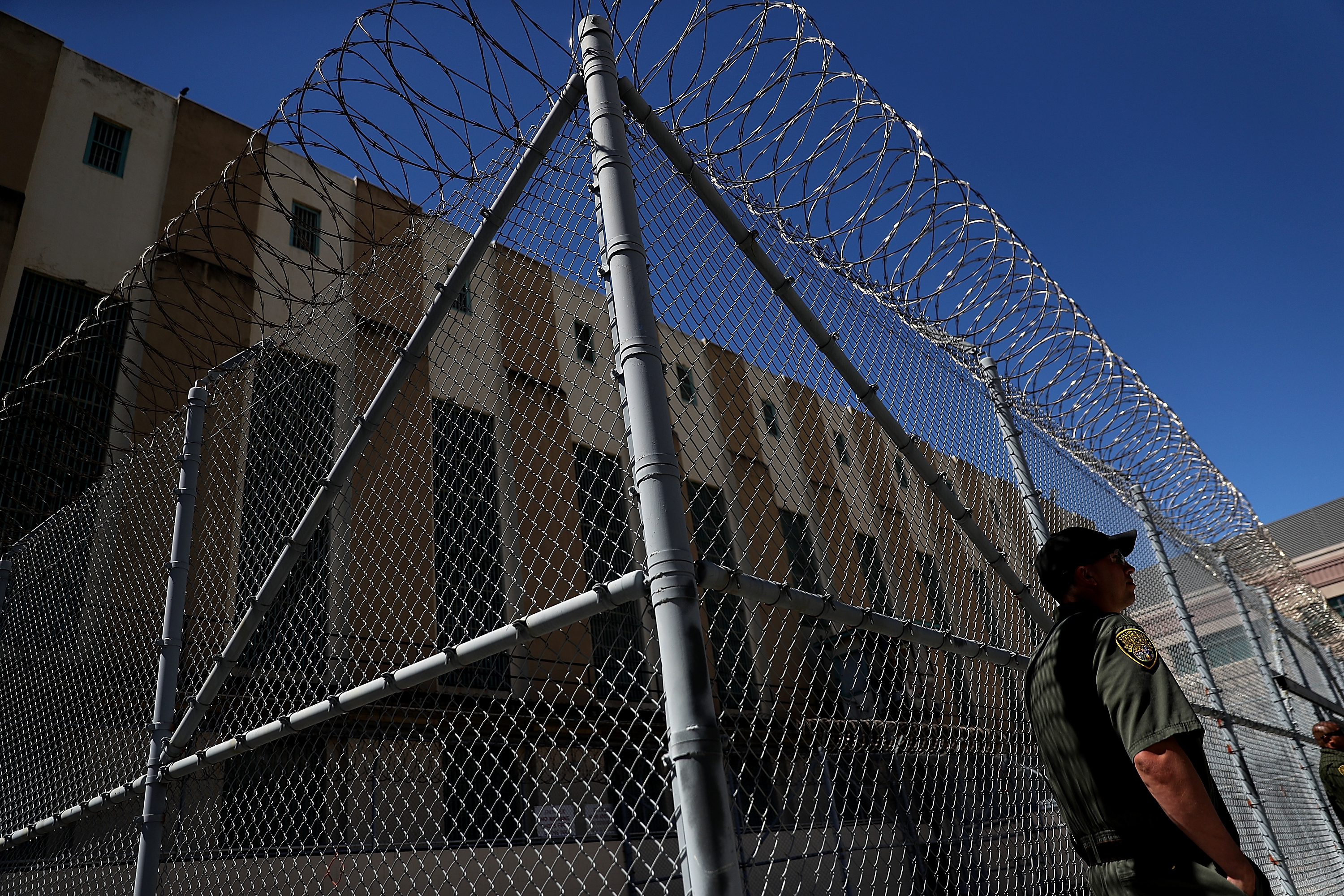 An armed California Department of Corrections and Rehabilitation officer stands guard at San Quentin State Prison's death row on Aug. 15, 2016. (Justin Sullivan / Getty Images)