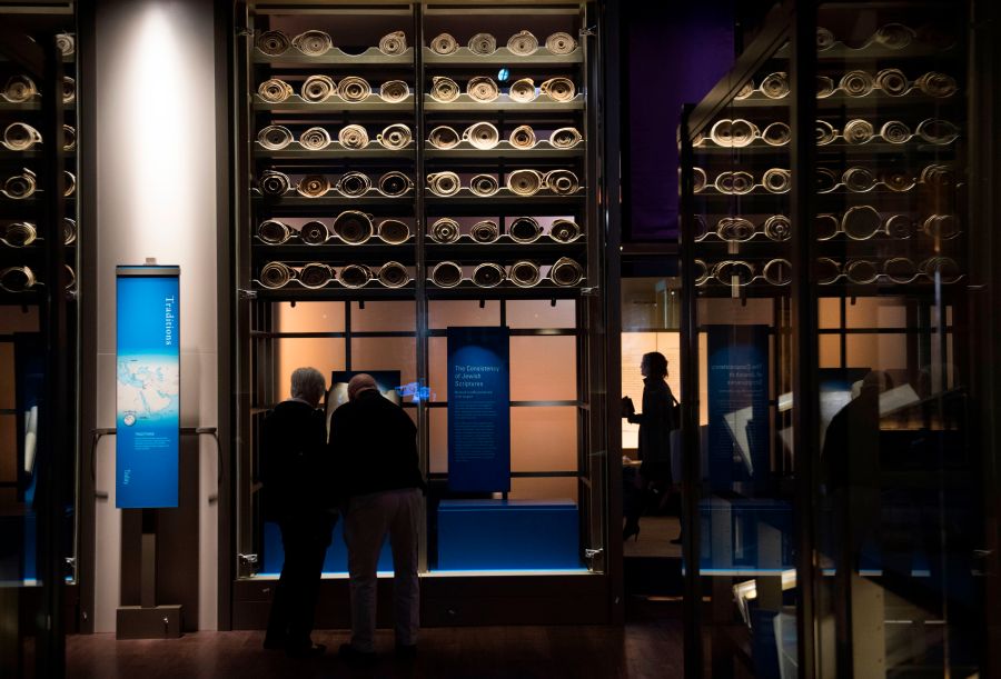 Visitors tour the "History of the Bible" exhibit during a media preview of the new Museum of the Bible in Washington, D.C., Nov. 14, 2017. (Credit: Saul Loeb / AFP / Getty Images)