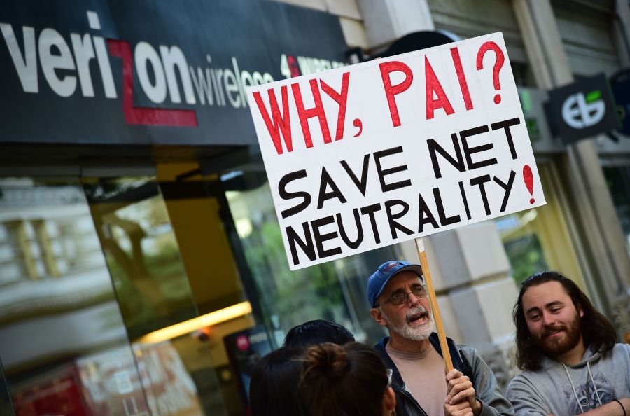 Protesters supporting net neutrality rally against a plan by Federal Communications Commission head Ajit Pai outside a Verizon store on Dec. 7, 2017 in Los Angeles. (Credit: ROBYN BECK/AFP/Getty Images)