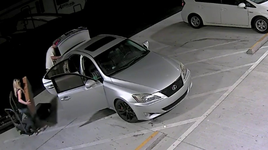 Police released this surveillance video showing a man and woman suspected of stealing guitars from a storage unit in Irvine. The video was released on Oct. 18, 2018.