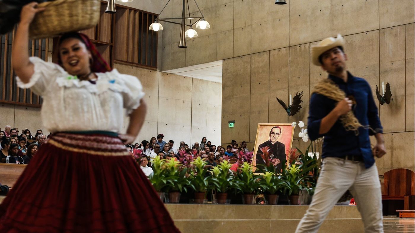 Folkloric dancers perform at a mass at the Cathedral of Our Lady of the Angels in downtown Los Angeles, on Oct. 14. 2018, celebrating the sainthood of slain Salvadoran Archbishop Oscar Romero and others. (Credit: Maria Alejandra Cardona / Los Angeles Times)