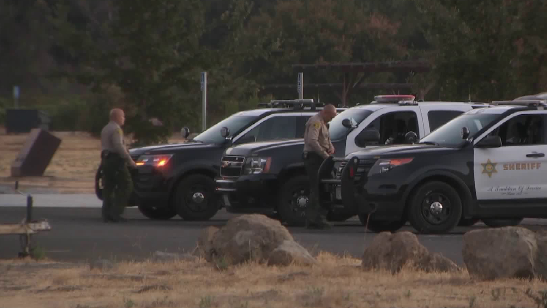 Law enforcement officials search for an armed burglar in Malibu Creek State Park on Oct. 6, 2018. (Credit: KTLA)