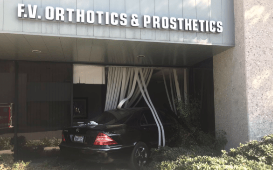 A car crashed into the storefront of F.V. Orthotics & Prosthetics on Oct. 25. (Credit: KTLA)