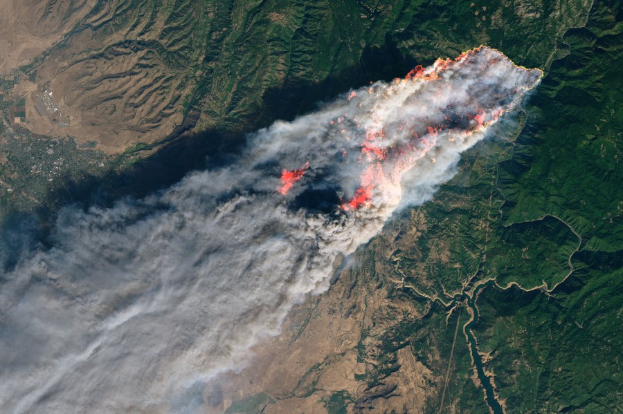 An image released by NASA on Nov. 9, 2018, shows the devastating and deadly Camp Fire in Northern California, as seen from space.