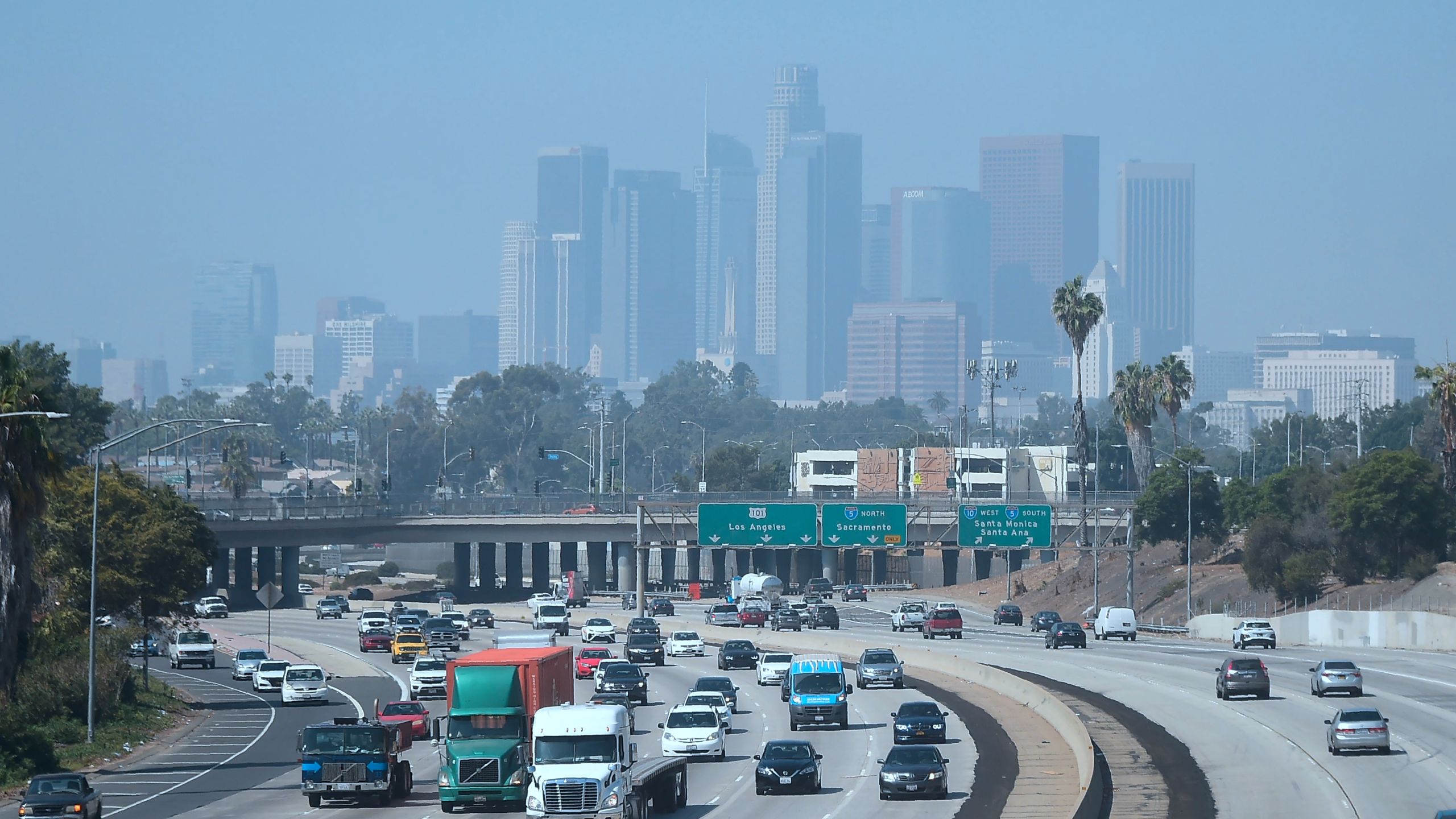 Buildings in downtown Los Angeles are seen on a hazy morning on Sept. 21, 2018. (Credit: FREDERIC J. BROWN/AFP/Getty Images)