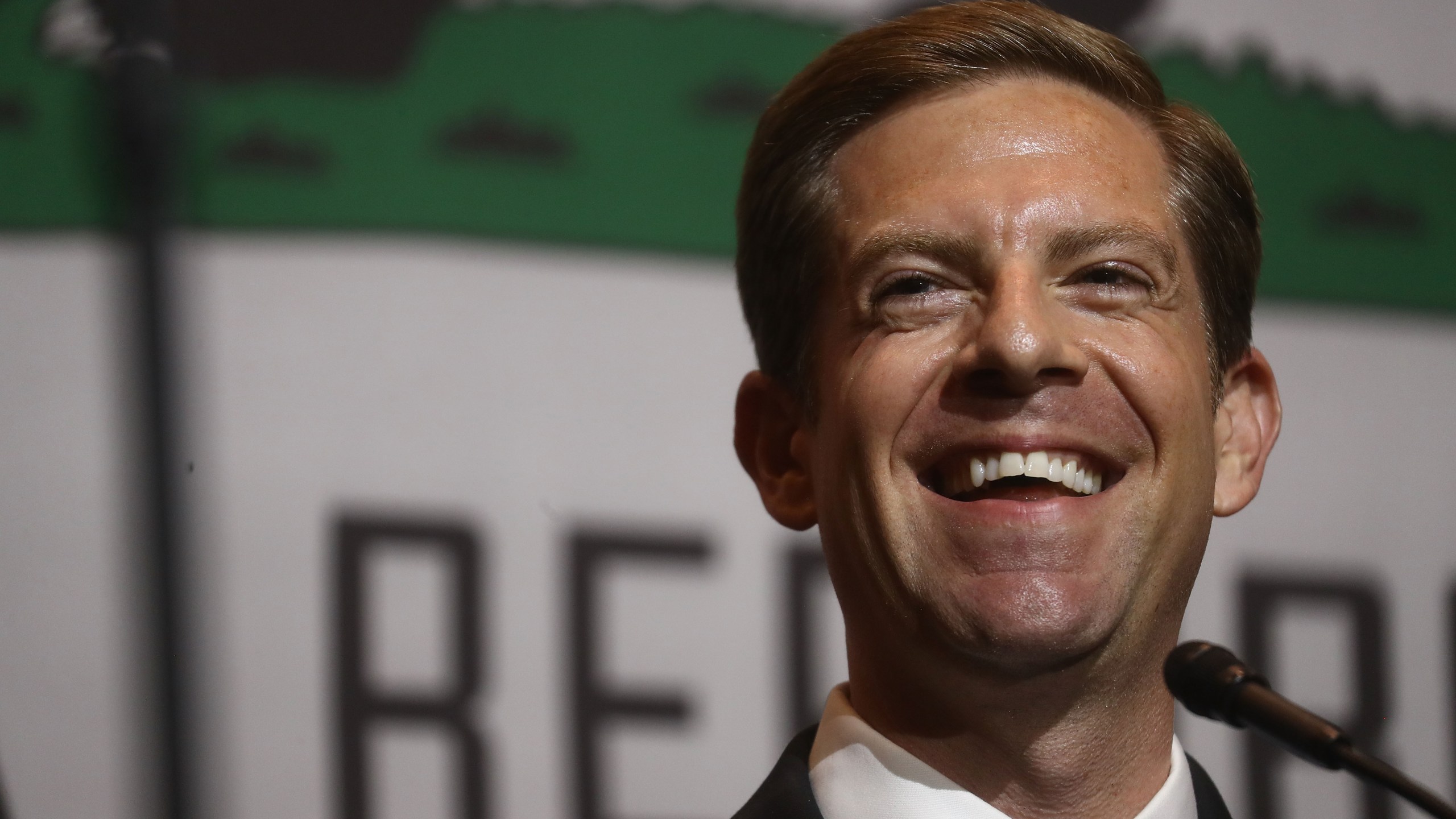 Democratic congressional candidate Mike Levin (CA-49) smiles at a 2018 midterm elections rally on Oct. 4, 2018, in Fullerton. (Credit: Mario Tama/Getty Images)