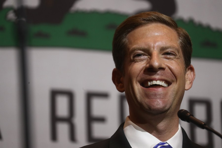 Democratic congressional candidate Mike Levin (CA-49) smiles at a 2018 midterm elections rally on Oct. 4, 2018, in Fullerton. (Credit: Mario Tama/Getty Images)