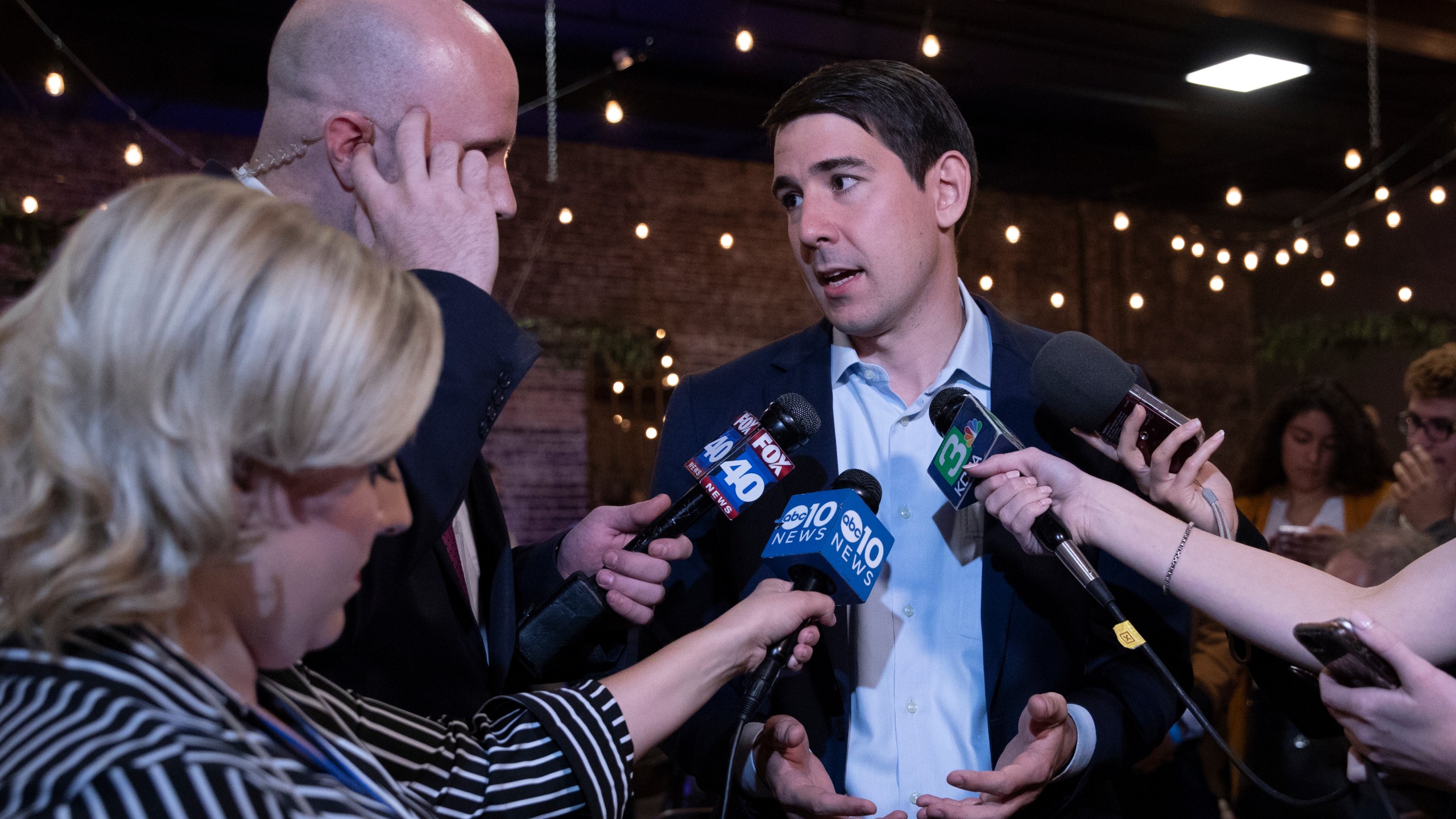 Democratic candidate for California's 10th Congressional District Josh Harder speaks with television reporters during an election night event in Modesto on Nov. 6, 2018. (Credit: Alex Edelman / Getty Images)