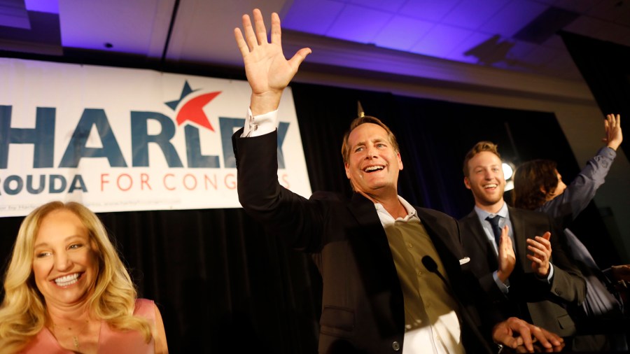 Harley Rouda speaks to supporters with his family during their election day party at the Newport Beach Marriott Hotel and Spa on Nov. 6, 2018, in Newport Beach, California. (Credit: Barbara Davidson/Getty Images)