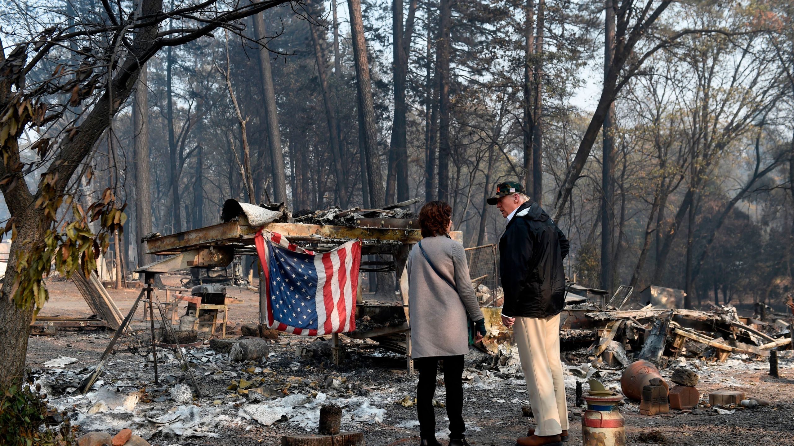 Donald Trump views damage from the Camp Fire in Paradise, California on Nov. 17, 2018. (Credit: SAUL LOEB/AFP/Getty Images)