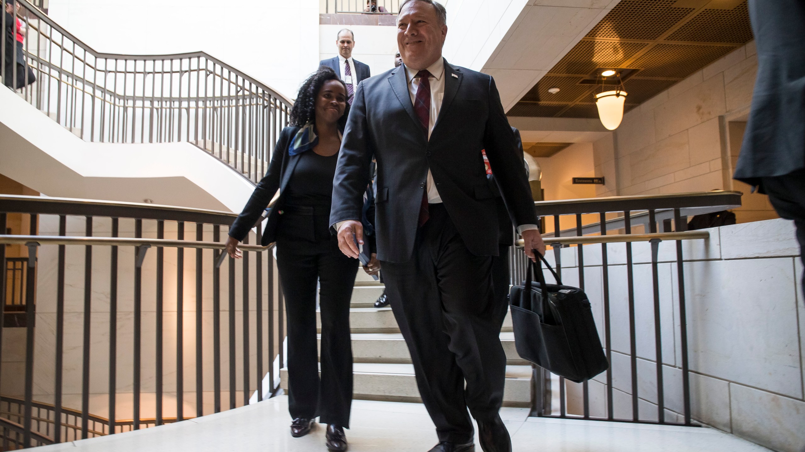 U.S. Secretary of State Mike Pompeo walks to a briefing with members of the Senate to discuss developments in Saudi Arabia on Nov. 28, 2018. (Credit: Zach Gibson/Getty Images)