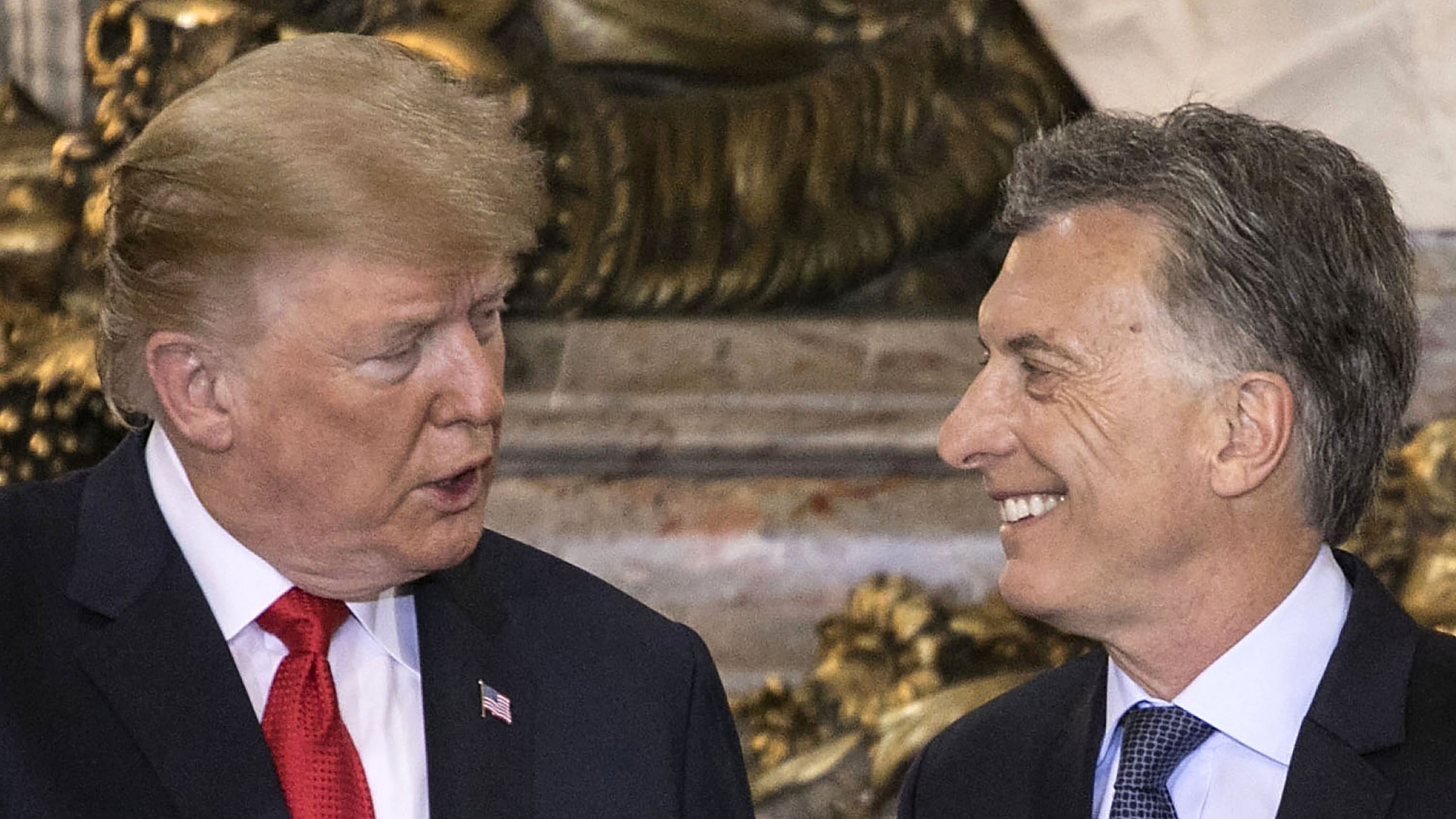 U.S. President Donald Trump is welcomed by Argentina's President Mauricio Macri at Casa Rosada presidential house in Buenos Aires, on November 30, 2018. (Credit: RAGGIO ALBERTO/AFP/Getty Images)