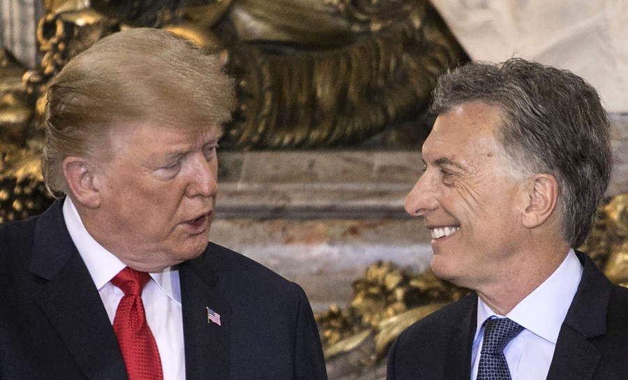 U.S. President Donald Trump is welcomed by Argentina's President Mauricio Macri at Casa Rosada presidential house in Buenos Aires, on November 30, 2018. (Credit: RAGGIO ALBERTO/AFP/Getty Images)