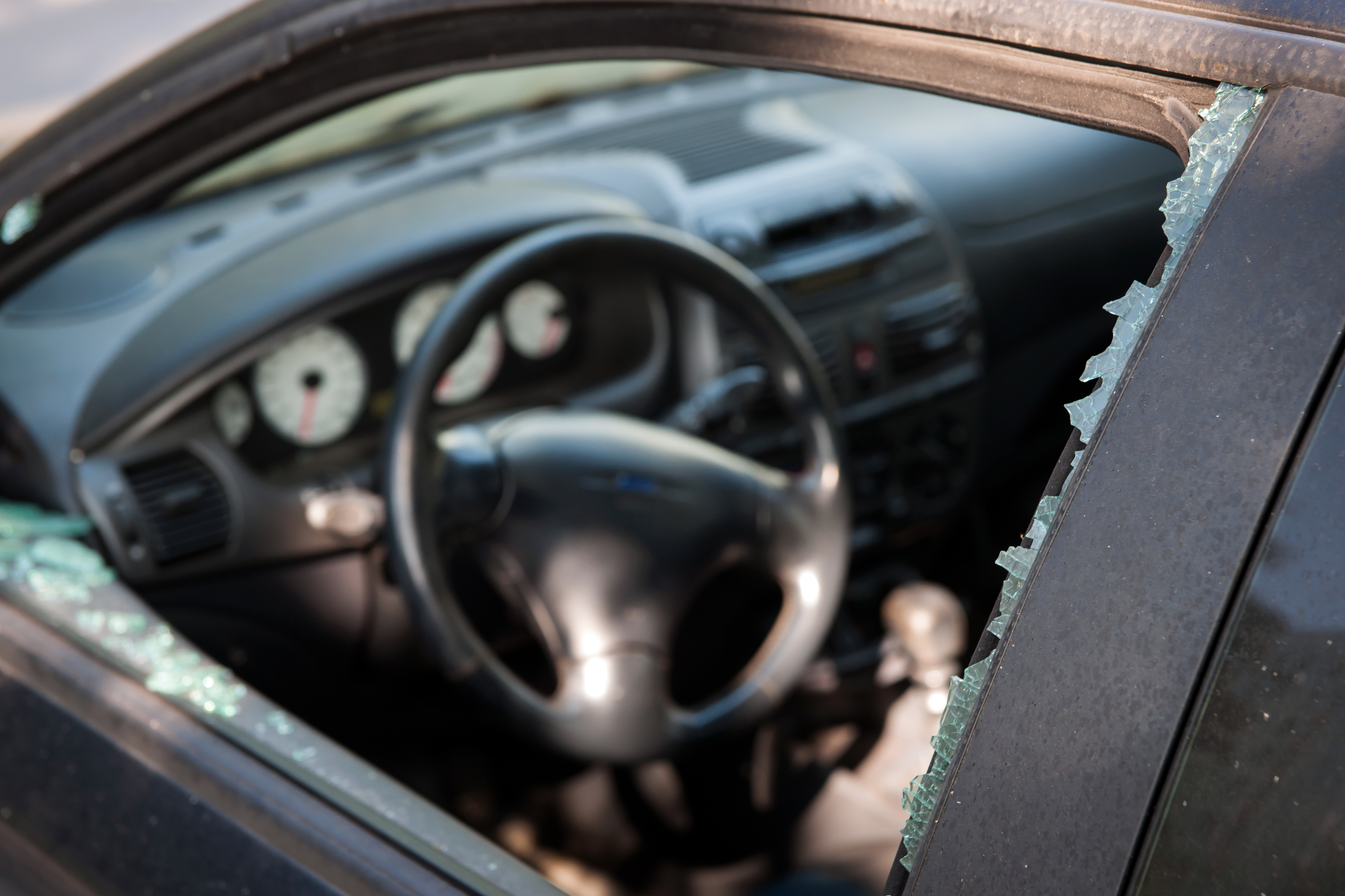 A broken car window is seen in a file photo. (iStock / Getty Images Plus)