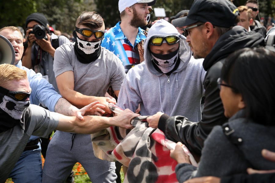 Trump supporters clash with protesters at a "Patriots Day" free speech rally on April 15, 2017 in Berkeley. (Credit: Elijah Nouvelage/Getty Images)