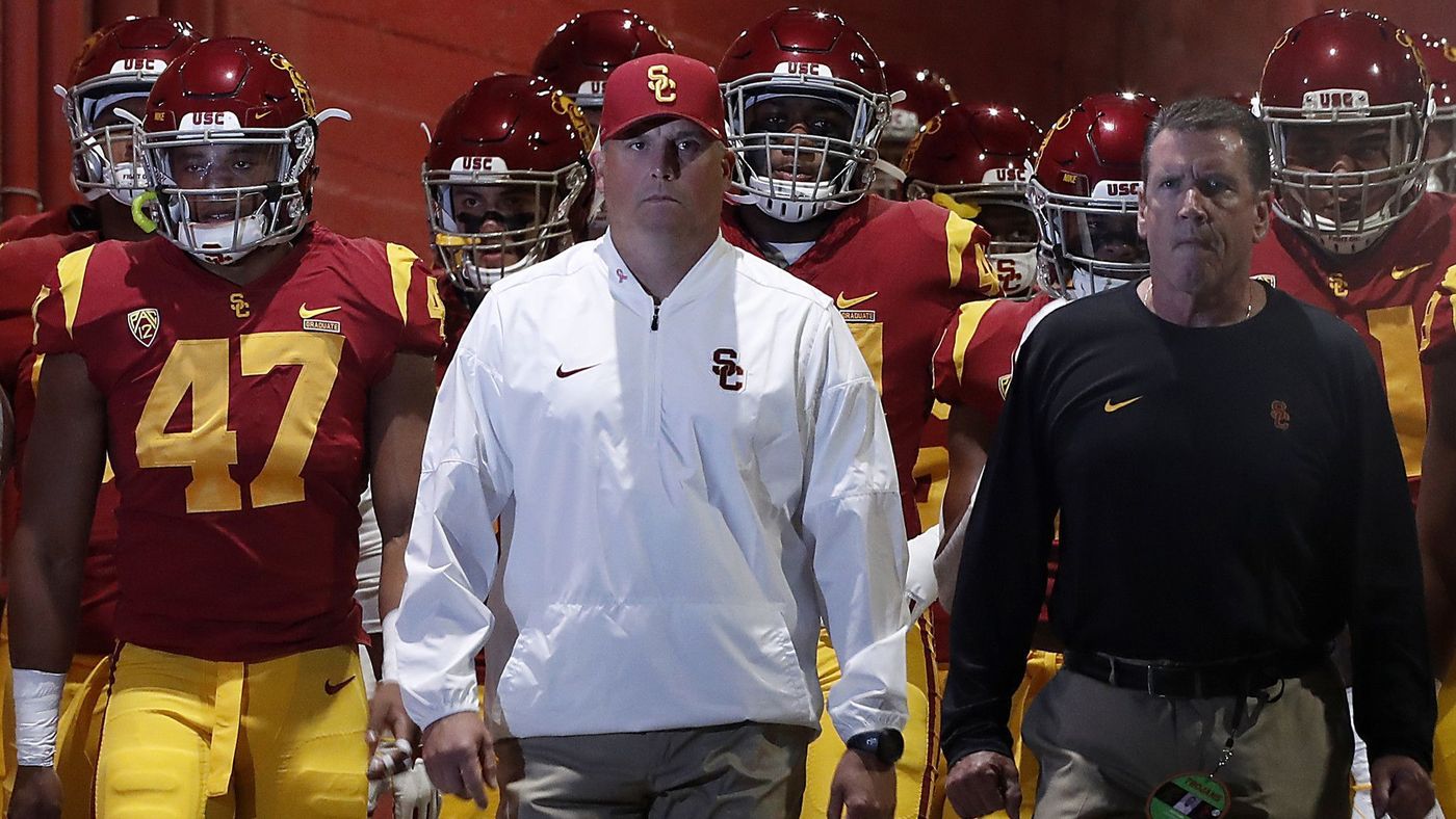 USC head coach Clay Helton leads the Trojans out of the tunnel for a game against Colorado. (Luis Sinco/Los Angeles Times)