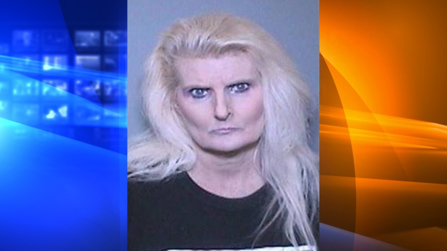 Denise Christine Latta, 54, of Huntington Beach, pictured in a booking photo released by the Tustin Police Department following her arrest on Nov. 29, 2018.