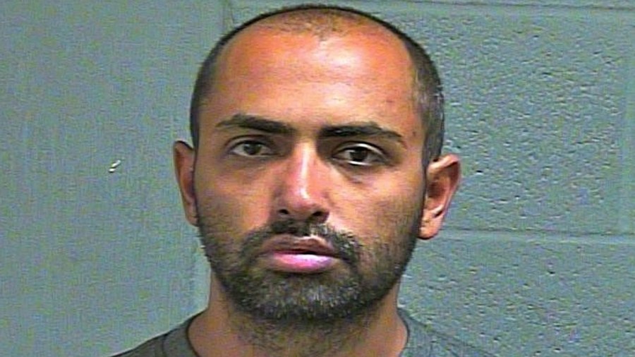 Amiremad Nayebyazdi is seen in a booking photo. (Credit: Oklahoma County Sheriff's Office)