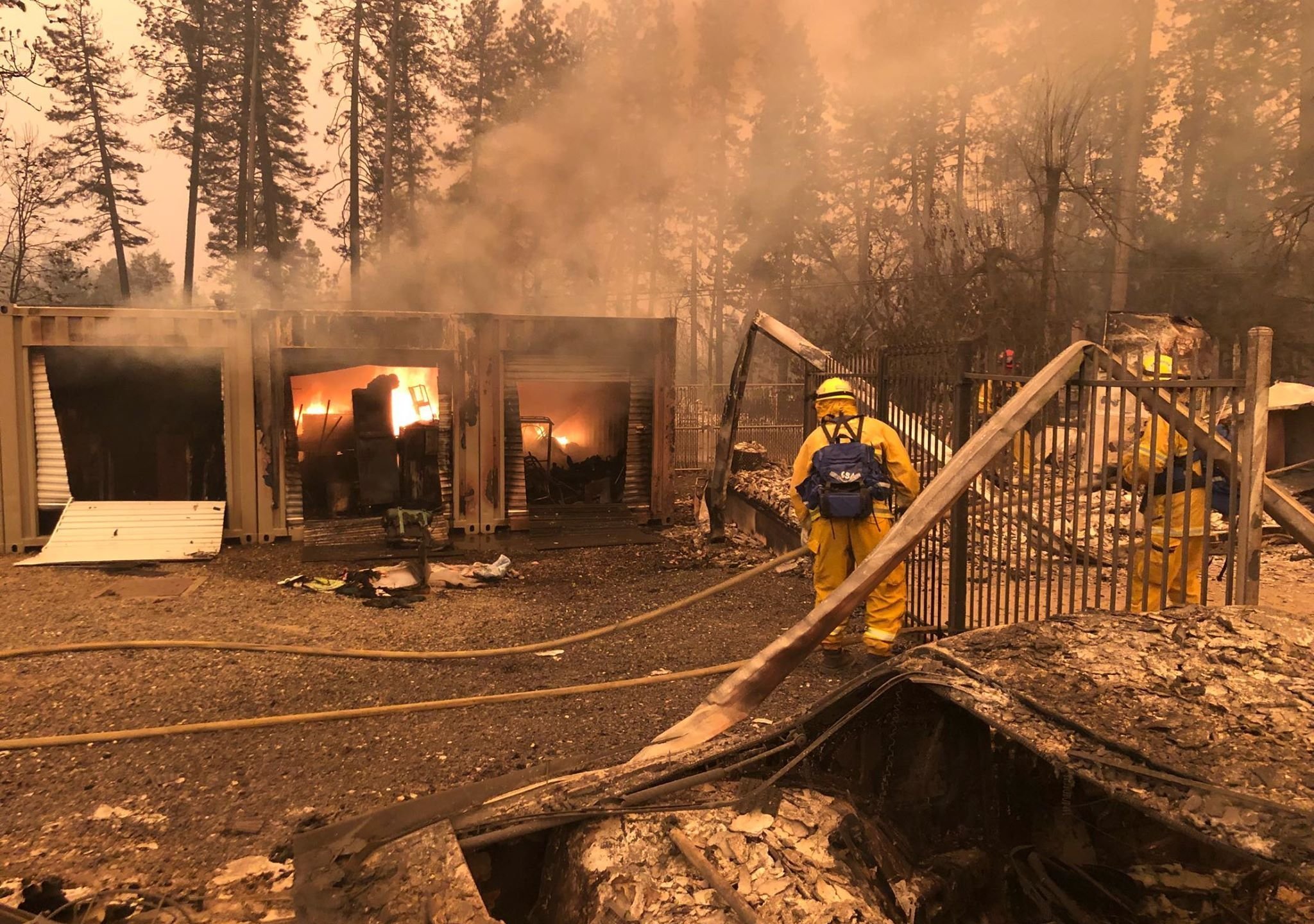 House and car damaged in Paradise, California from the Camp Fire on Nov. 8, 2018. (Credit: Nick Valencia/CNN)