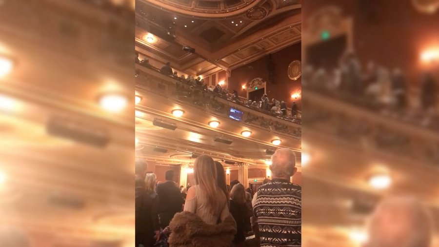 Audience members react to a man's outburst during an intermission of "Fiddler on the Roof" in Baltimore. (Credit: Rich Scherr/Facebook)