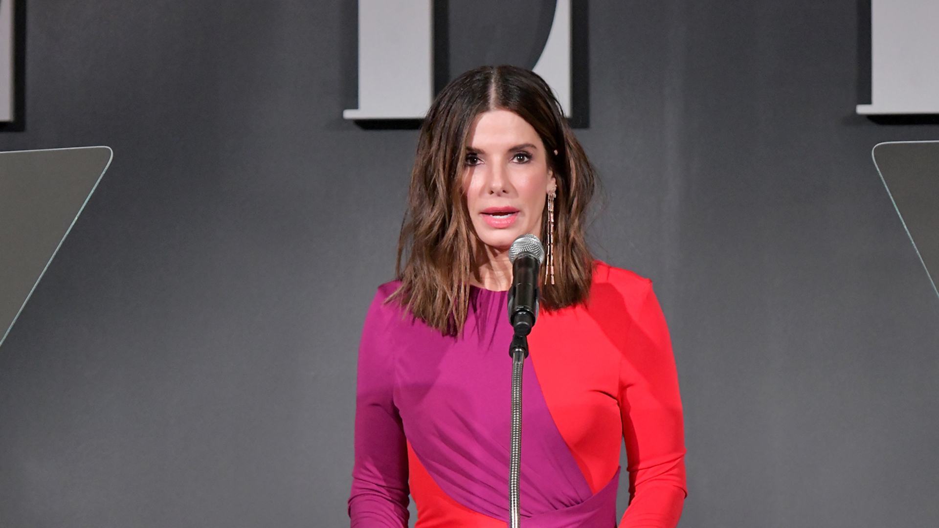 Sandra Bullock speaks onstage at ELLE's 25th Annual Women In Hollywood Celebration presented by L'Oreal Paris, Hearts On Fire and CALVIN KLEIN at Four Seasons Hotel Los Angeles at Beverly Hills on October 15, 2018. (Credit: Neilson Barnard/Getty Images for ELLE Magazine)