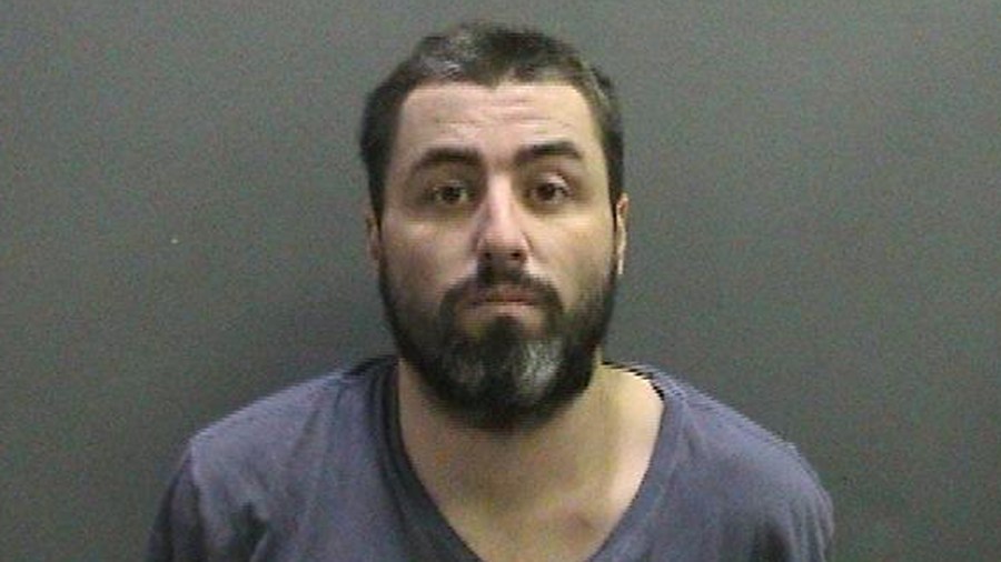 Brandon Walter Stewart, 33, is seen in a photo released by the Orange County DA's office on Nov. 19, 2018.