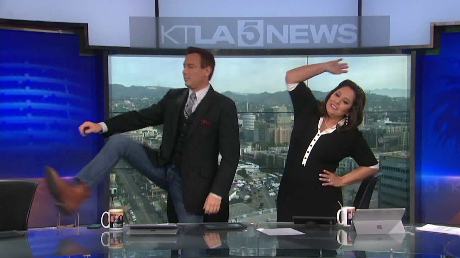 Chris Burrous and Lynette Romero do the 8:38 stretch during the KTLA 5 Weekend Morning News in this undated photo. (Credit: KTLA)