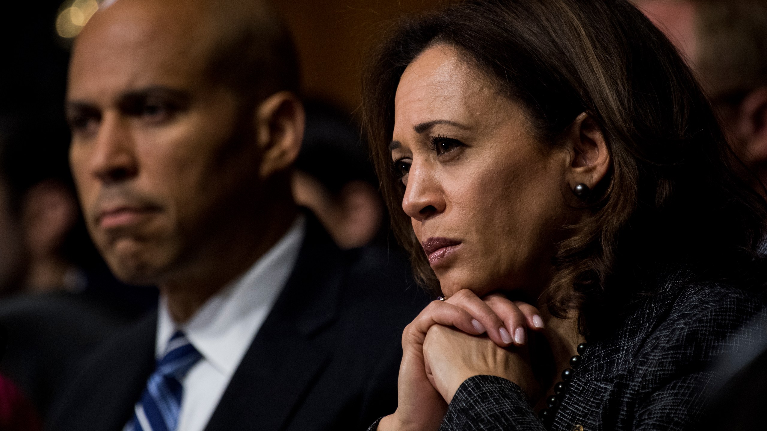 Sen. Cory Booker (D-N.J.) and Sen. Kamala Harris (D-Calif.) listen as Dr. Christine Blasey Ford testifies during the Senate Judiciary Committee hearing on the nomination of Brett M. Kavanaugh to be an associate justice of the Supreme Court of the United States on Capitol Hill Sept. 27, 2018, in Washington, D.C. The two and South Carolina Sen. Tim Scott proposed a bill to outlaw lynching that passed in the Senate on Dec. 19, 2018. (Credit: Tom Williams-Pool/Getty Images)