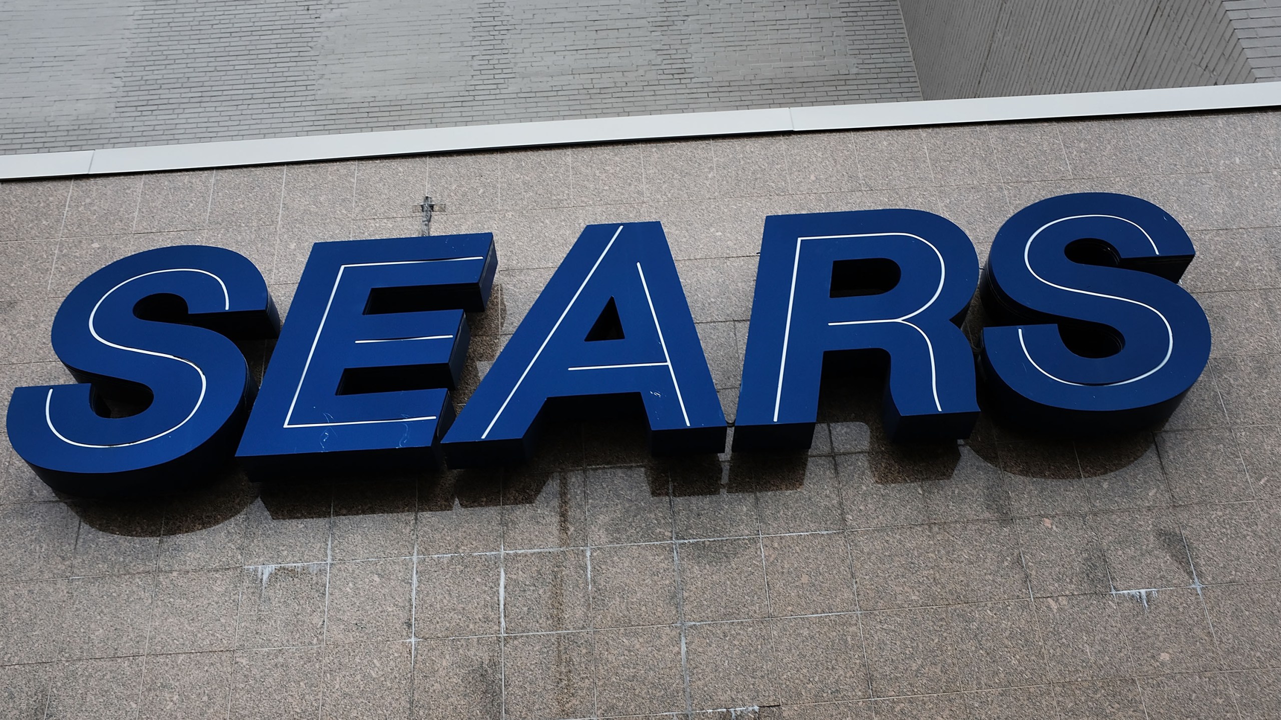 A Sears sign is displayed at a store on Oct. 15, 2018, in the Brooklyn borough of New York City. (Credit: Spencer Platt / Getty Images)