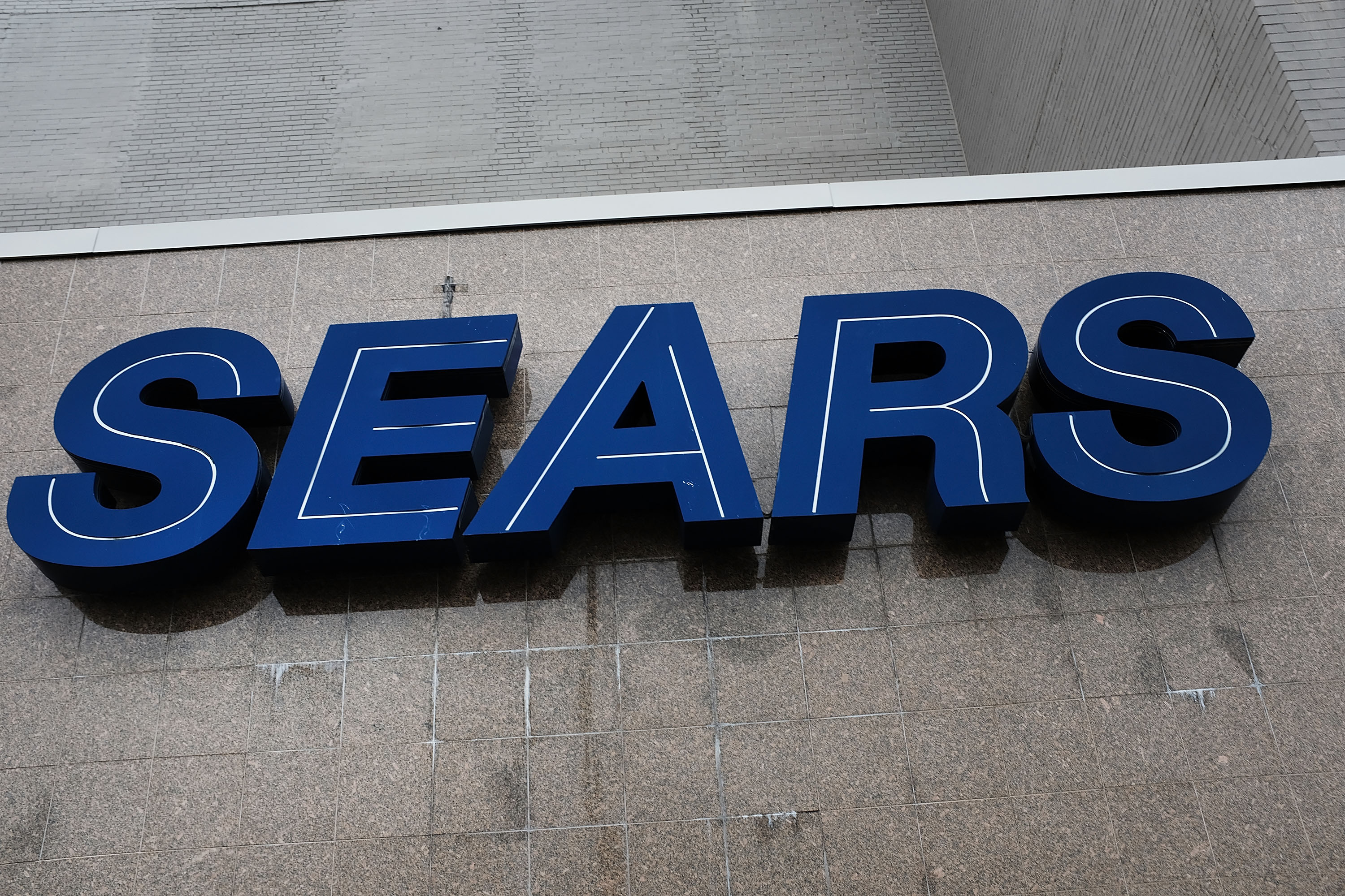 A Sears sign is displayed at a store on Oct. 15, 2018, in the Brooklyn borough of New York City. (Credit: Spencer Platt / Getty Images)