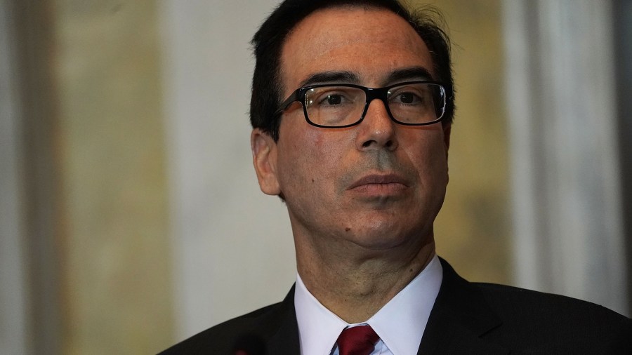 U.S. Secretary of the Treasury Steven Mnuchin listens during a Financial Stability Oversight Council meeting Oct. 16, 2018 at the Treasury Department. (Credit: Alex Wong/Getty Images)