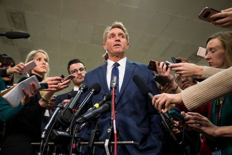 Sen. Jeff Flake (R-AZ) speaks to the press after receiving a briefing from U.S. Secretary of Defense Jim Mattis and U.S. Secretary of State Mike Pompeo on developments in Saudi Arabia on Nov. 28, 2018. (Credit: Zach Gibson/Getty Images)