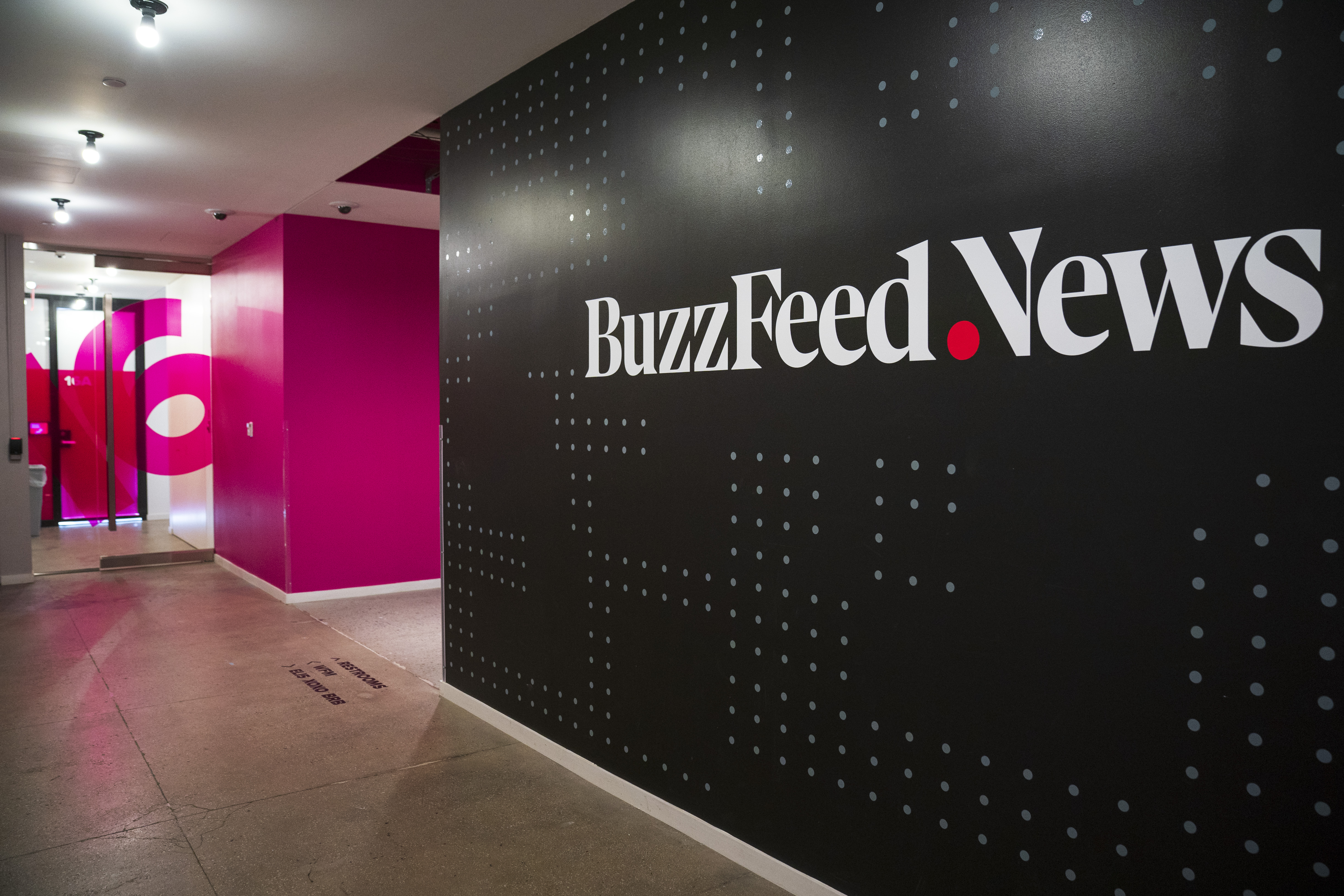 A BuzzFeed News logo adorns a wall inside BuzzFeed headquarters on Dec. 11, 2018 in New York City. (Credit: Drew Angerer/Getty Images)