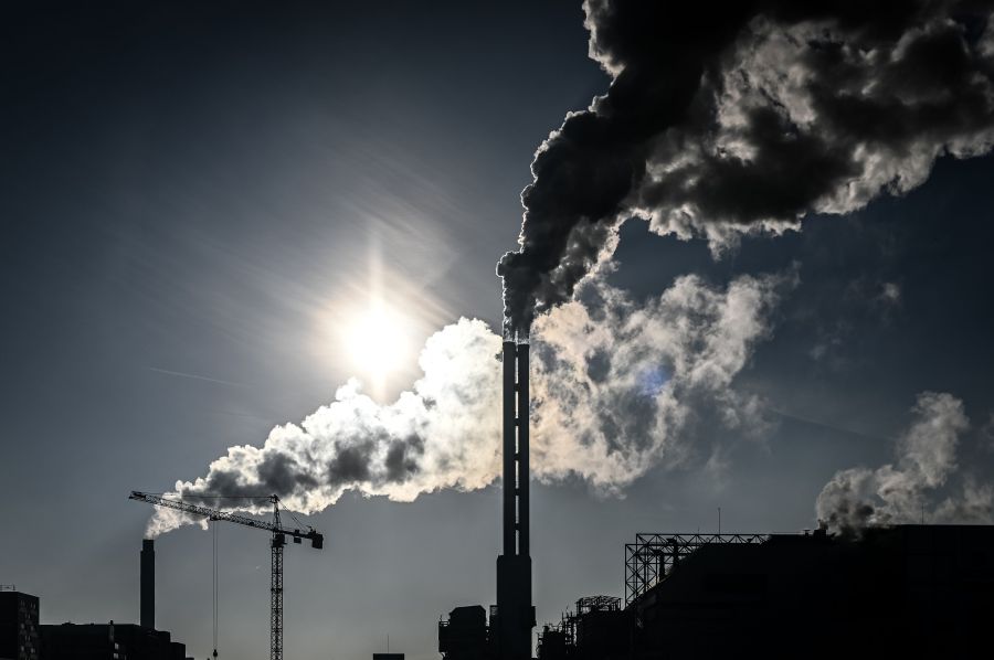 Smoke rises from the chimneys of a waste incineration plant in Saint-Ouen on the outskirts of the French capital Paris, on December 12, 2018. (Credit: PHILIPPE LOPEZ/AFP/Getty Images)