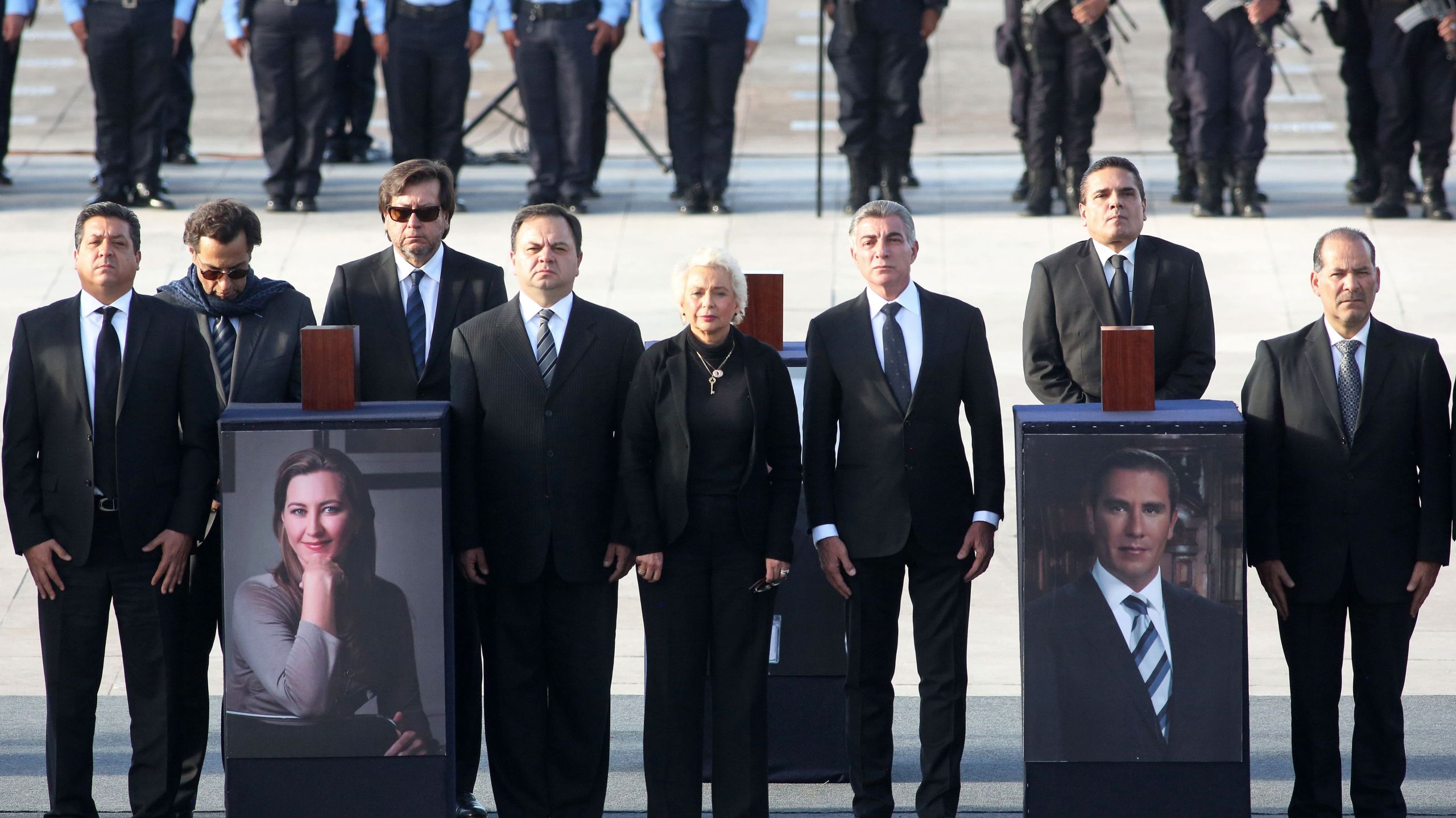 Mexican Interior Minister Olga Sanchez Cordero, center, participates in a ceremony at La Victoria square in Puebla on Dec. 25, 2018 in honor of the governor of the Mexican state of Puebla, Martha Erika Alonso, and her husband, senator and former governor of the same region, Rafael Moreno. (Credit: JOSE CASTANARES/AFP/Getty Images)