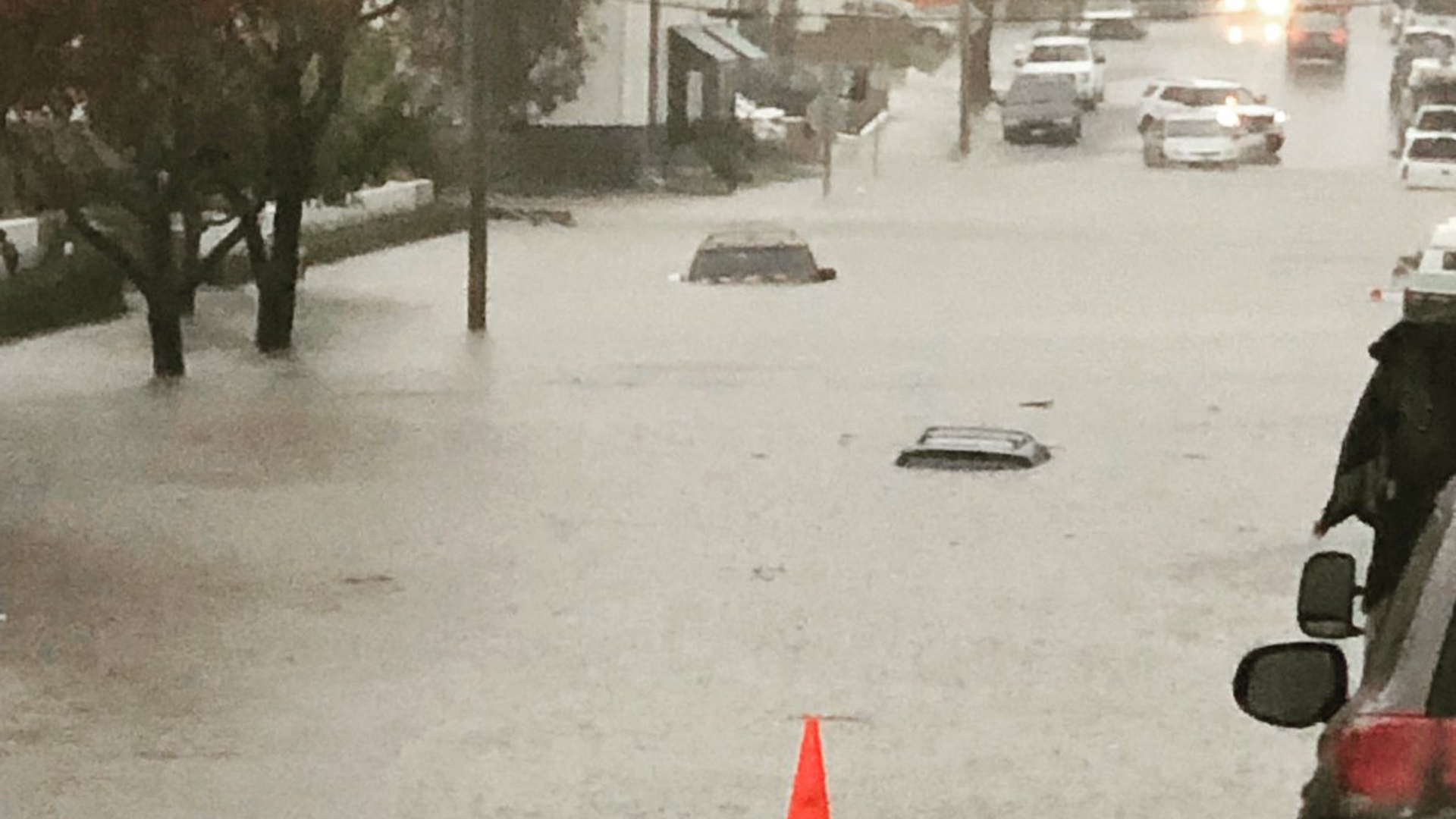 Water submerges cars at 17th Street and Pomona Avenue in Costa Mesa during a storm on Dec. 6, 2018. (Credit: Costa Mesa Police Department)