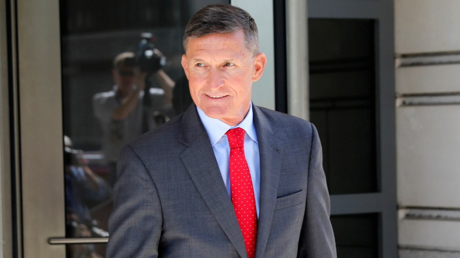 Michael Flynn, former national security advisor to President Donald Trump, departs the E. Barrett Prettyman United States Courthouse following a pre-sentencing hearing July 10, 2018, in Washington, D.C. (Credit: Aaron P. Bernstein/Getty Images)