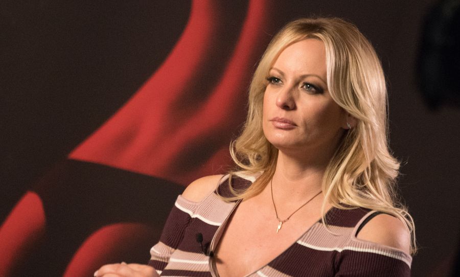 Stormy Daniels talks with a journalist during an interview in Berlin, Germany, on October 11, 2018. (Credit: Ralf Hirschberger/AFP/Getty Images)