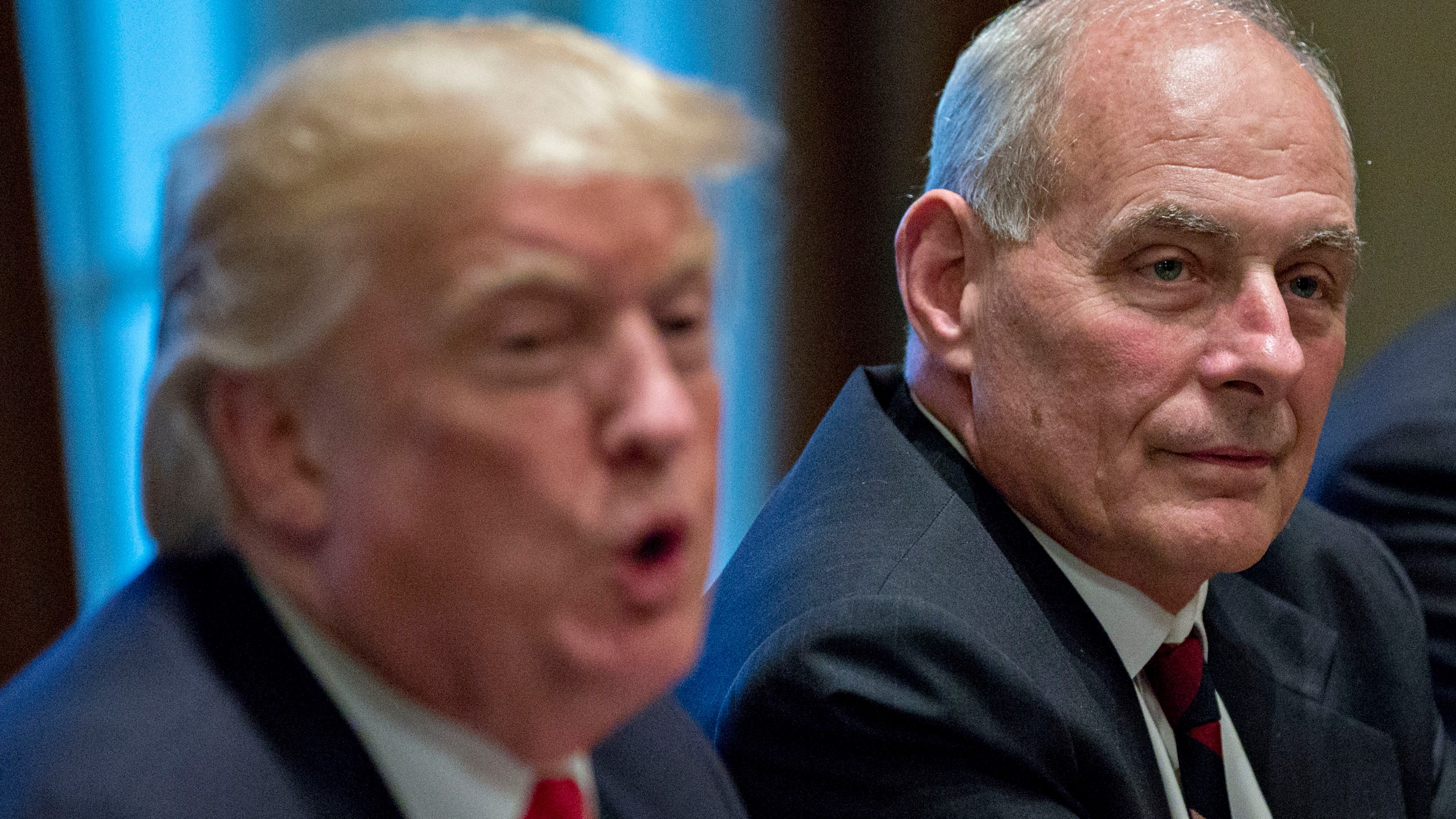 John Kelly listens as Donald Trump speaks at a briefing with senior military leaders in the Cabinet Room of the White House on Oct. 5, 2017 in Washington, D.C. (Credit: Andrew Harrer-Pool/Getty Images)