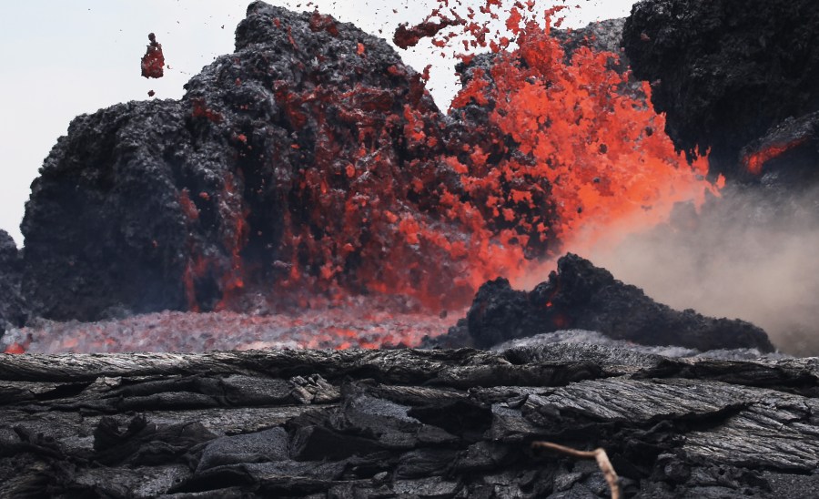 Lava erupts from a Kilauea volcano fissure in Leilani Estates, on Hawaii's Big Island, on May 24, 2018, in Pahoa, Hawaii. (Credit: Mario Tama/Getty Images)