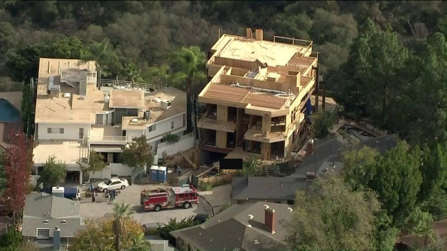 A worker died in an accident at a residential construction site in Bel Air on Dec. 17, 2018. (Credit: KTLA)