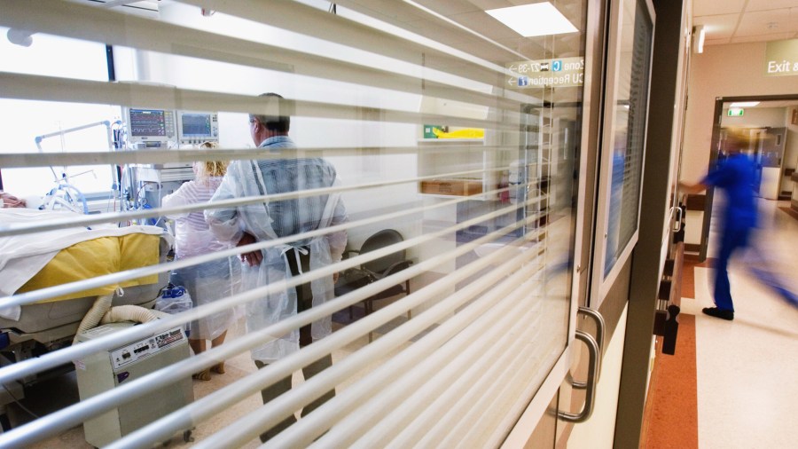 Family members visit an intensive care patient at Westmead Hospital March 12, 2007, in Sydney, Australia. (Credit: Ian Waldie/Getty Images)