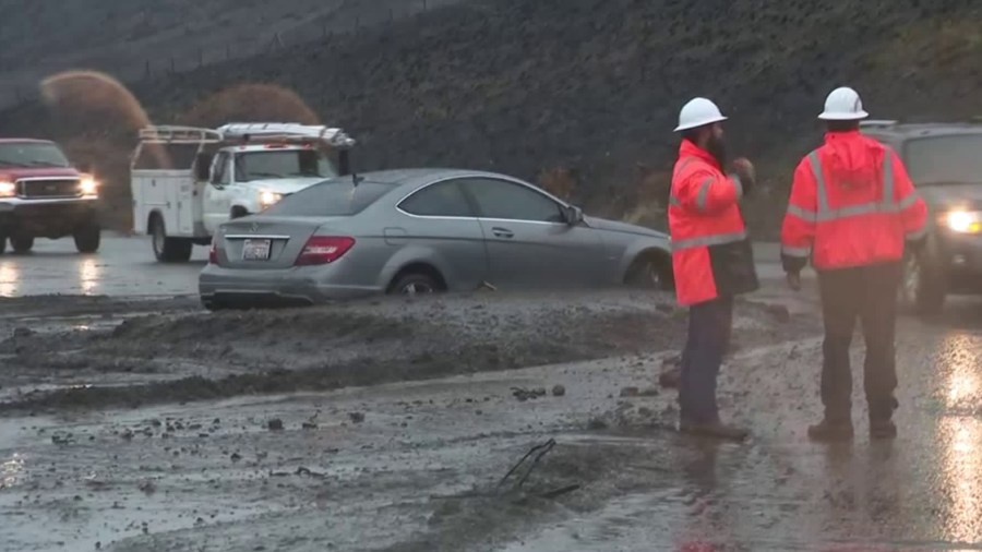 A stretch of PCH was inundated by mud and debris after a mudslide hit a portion of the highway in Malibu on Dec. 6, 2018. (Credit: KTLA)