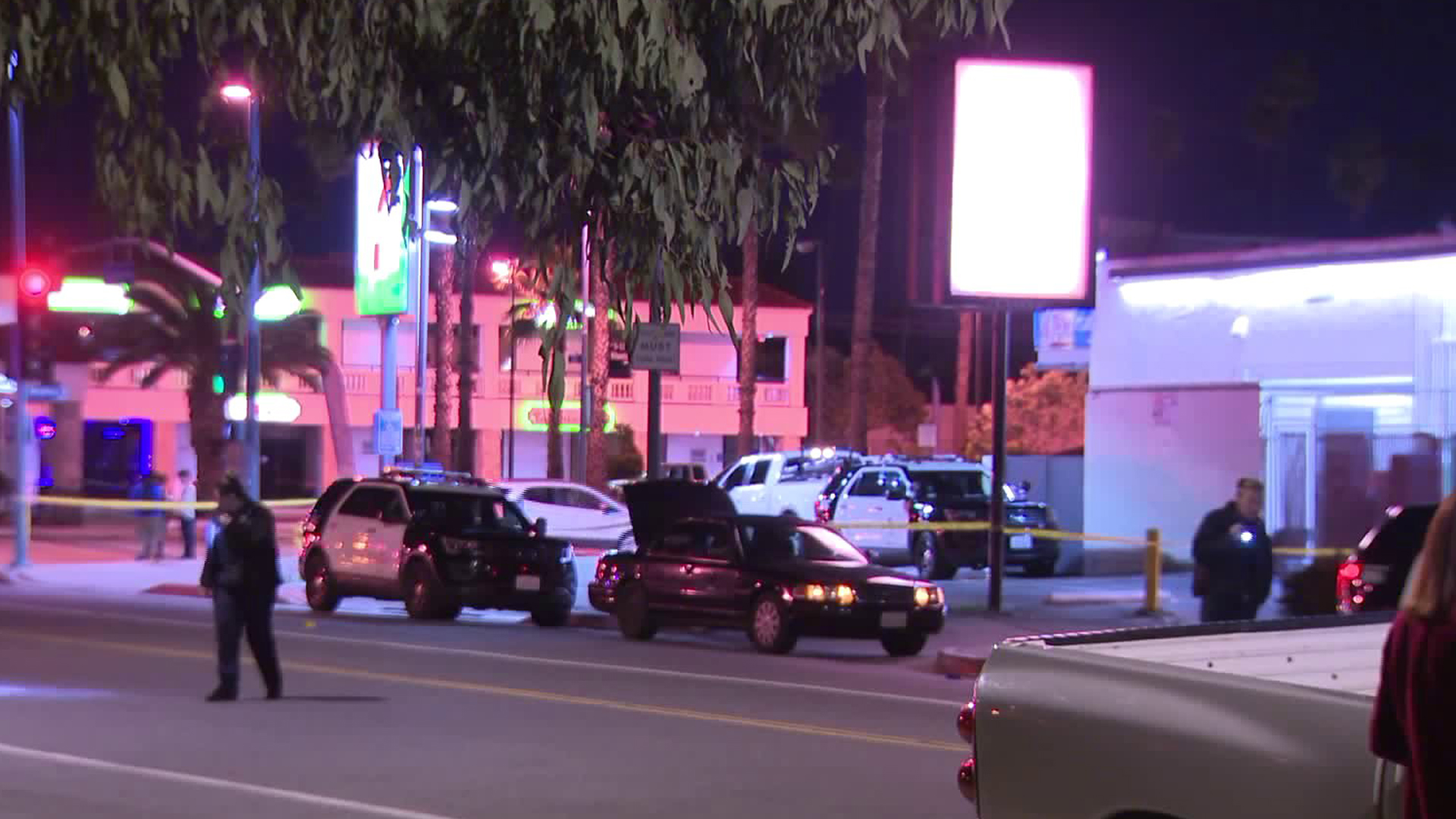 Police investigate the scene in North Hollywood where a man and woman crashed a vehicle after being shot on Dec.7, 2018. (Credit: KTLA)