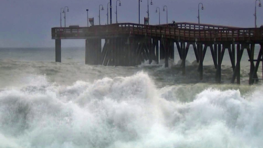 The Ventura Pier is surrounded by high surf on Dec. 17, 2018. (Credit: KTLA)