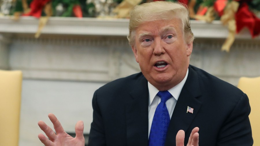 U.S. President Donald Trump speaks about border security with House Minority Leader Nancy Pelosi (D-CA) and Vice President Mike Pence in the Oval Office on Dec.11, 2018, in Washington, D.C. (Credit: Mark Wilson/Getty Images)