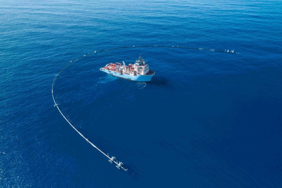 The 2,000-foot-long system created to clean up plastic pollution in the Pacific Ocean appears in an undated photo. (Credit: The Ocean Cleanup via CNN)