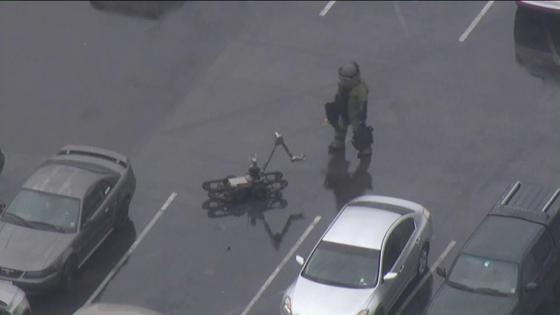 A bomb squad technician is seen working at Citrus College in Glendora during a campus lockdown on Jan. 15, 2019. (Credit: Sky5)